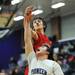 Pioneer High School's Ethan Spencer has his shot blocked by Bedford High School's Jackson Lamb during the first quarter at Pioneer on Tuesday, Feb. 19, 2013. Melanie Maxwell I AnnArbor.com